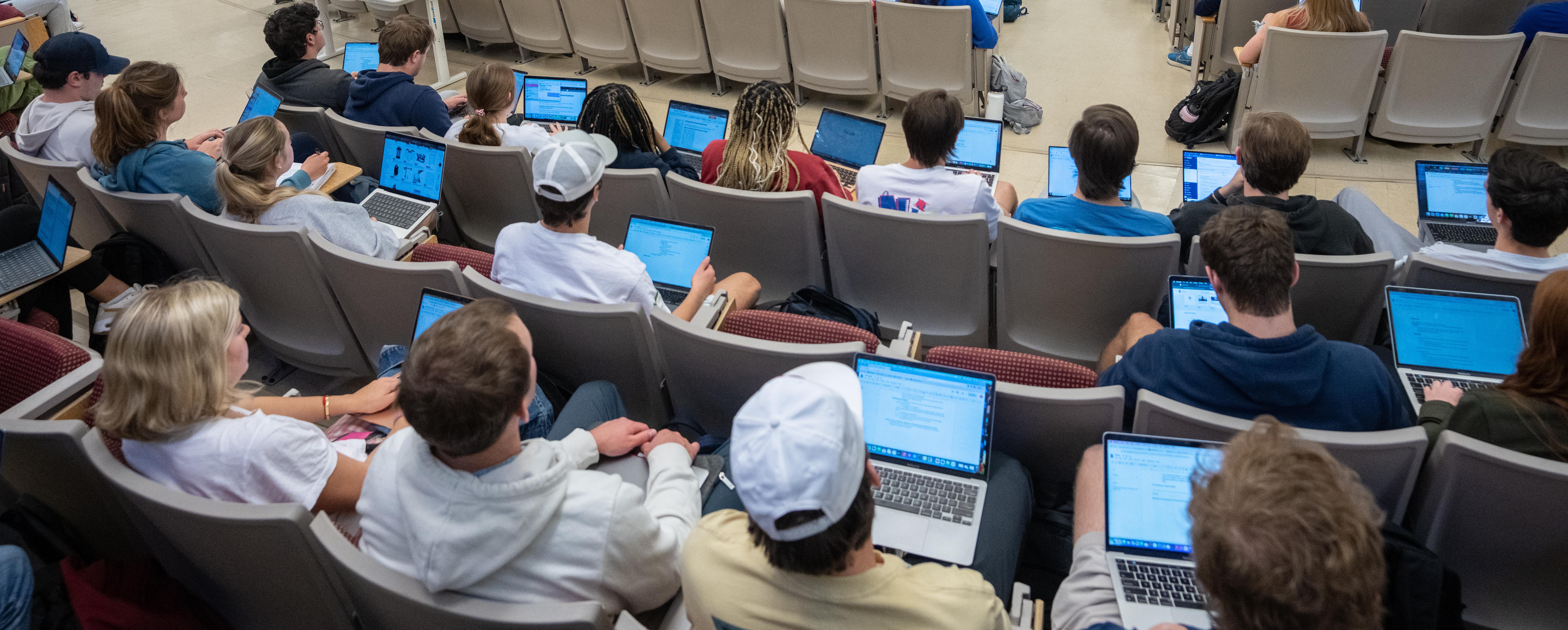 Students in class with computers